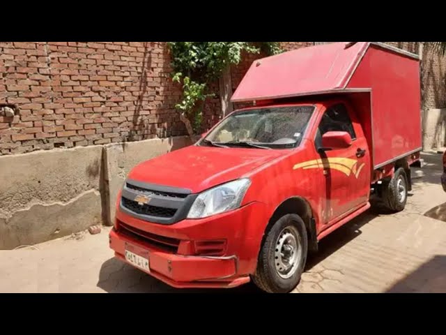 سيارة ربع نقل حمراء صندوق مغلق مبطن ضد حراره الشمس النوع شيفورليه موديل عام 2020 للايجار 
